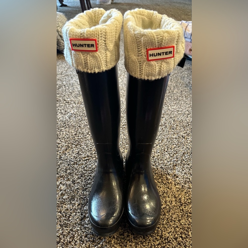Tall Hunter boots with size large Hunter socks